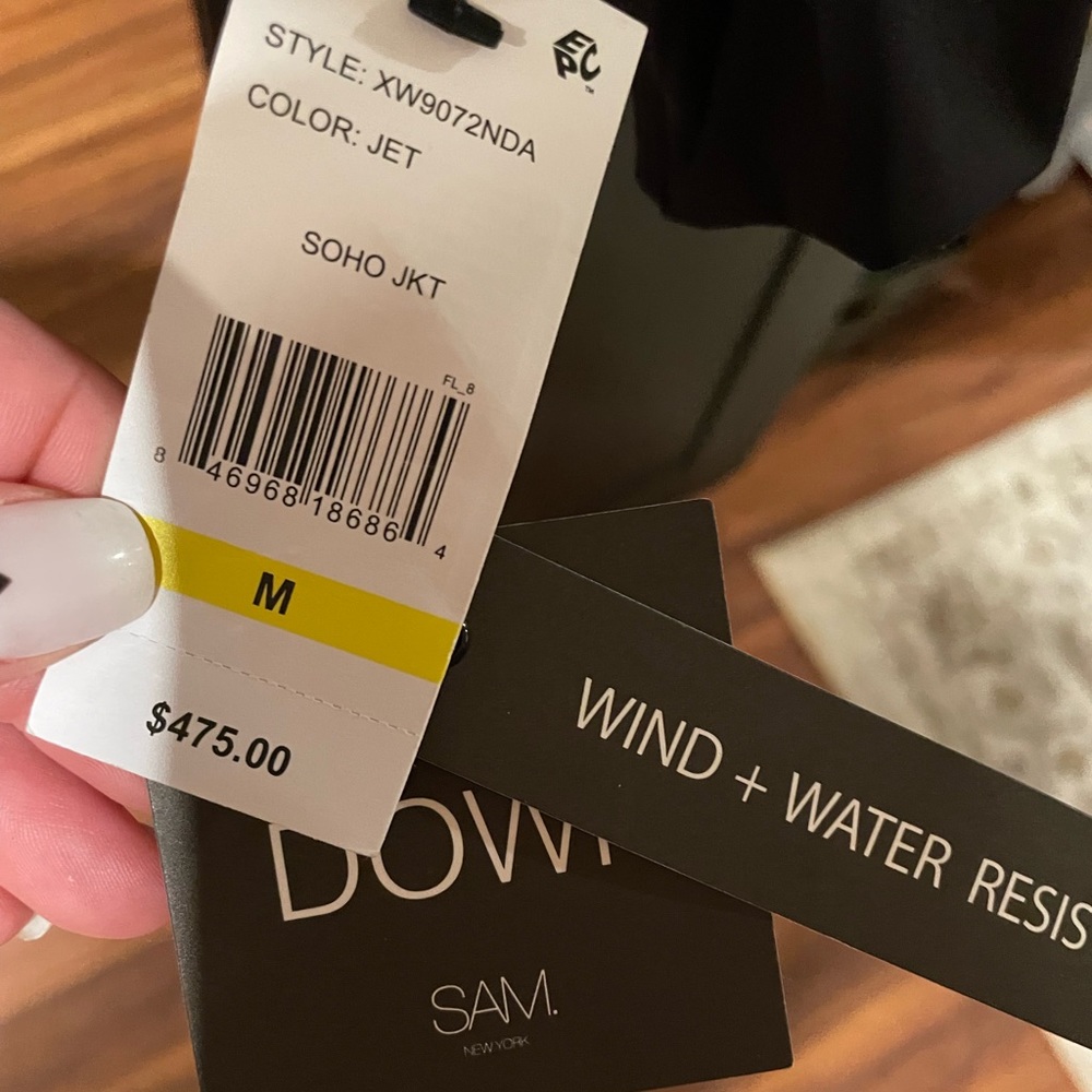 SAM. Black down puffer